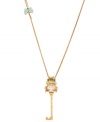 Quintessentially quirky! Betsey Johnson's long pendant necklace features a charming frog as well as a key. Embellished with glittering crystals and a bow, it's crafted in antique gold tone mixed metal. Approximate length: 34 inches + 3-inch extender. Approximate drop: 3 inches.