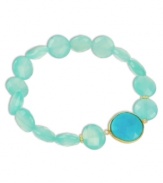 Ocean blue hues add an exotic touch to any look. This stunning stretch bracelet combines polished blue chalcedony (64 ct. t.w.) and turquoise (7-1/5 ct. t.w.) stones in an 18k gold over sterling silver setting. Bracelet stretches to fit wrist. Approximate length: 7-1/2 inches.