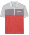 Cool color-blocking makes this Sean John polo an instant weekend must-have.