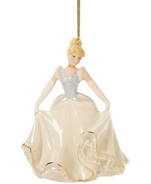 Fans of Disney will be enchanted by this beautiful Cinderella ornament from Lenox. The princess wears a traditional ballgown with sparkle accents. With gold hanging thread.