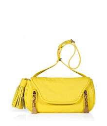 Add a pop of color to your outfit with See by Chlo?s radiant yellow textured leather crossbody bag - Flap with magnetic snap closure underneath, zippered front slit pockets with gold-toned logo engraved pulls, belted shoulder strap, oversized tassel at side - Wear with printed tops, favorite jeans and flats