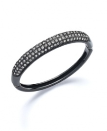 Sweet, contrasting colors play a standout part in your wardrobe. Charter Club's bold bangle features sparkling crystals that pop against a dark background. Crafted in hematite tone mixed metal. Approximate diameter: 2 inches.