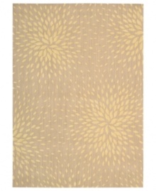 A chic starburst pattern adorns this stylish rug from the Capri collection, offering a unique focal point for any room. Woven of a blend of fine wool with Nourison's signature light-reflecting Luxcelle(tm) fibers, the rug's soft beige shade and luminous appearance complement a range of decors.