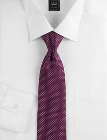 An elegant Italian silk design is finished with tiny dots allover. Silk Dry clean Made in Italy 