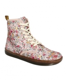 Unique floral patterns give the Shoreditch high top sneakers by Dr. Martens' a unique, trendy flair.