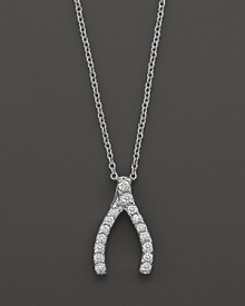 From the Tiny Treasures collection, a diamond wishbone necklace; with signature ruby accent. Designed by Roberto Coin.