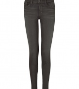 Make a stylish statement in these ultra-skinny jeans from cult denim line J Brand - Classic five-pocket styling, skinny leg, low-rise, 11-inch leg opening - Pair with an oversized graphic tee, a leather jacket, and platform heels