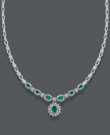 Take your evening wear from drab to dramatic with this lovely necklace by Effy Collection. A polished 14k white gold setting features oval-cut emeralds (17-7/8 ct. t.w.) surrounded by dazzling round-cut diamonds (2-1/3 ct. t.w.). Approximate length: 17 inches. Approximate drop: 1 inch.