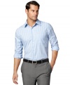 Stay smooth while looking sharp in this wrinkle free shirt by Van Heusen.