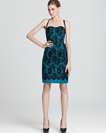 Lavish and lady-like, this bustier-style Milly lace print dress cuts a chic silhouette.