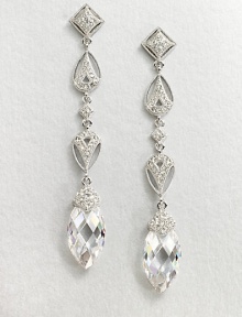 This refined piece features a long drop consisting of various shapes accented in pavé crystals, culminating in a faceted cubic zirconia stone. CrystalsCubic zirconiaRhodium-plated brassLength, about 2.5Post backImported 