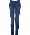 With a flattering mid-rise and classic skinny silhouette, Seven for all Mankinds mid-blue washed skinny jeans are a wardrobe staple for all four seasons - Classic five-pocket style, button closure, belt loops - Slim fit - Wear with practically anything for that effortless cool look