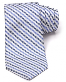 Michael Kors gets down to business with a luxuriously soft silk tie, featuring a simple gingham pattern for a breath of fresh air.