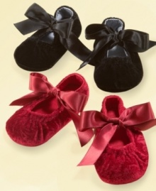 Pretty satin bows are the perfect ornament on these shoes that are holiday-ready for your little baby girl.