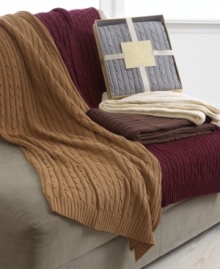 Draped on your sofa or tucked into the bed, this Lauren by Ralph Lauren Cable Knit throw is waiting to wrap you in the comfort and luxury of sweater-like softness. Featuring pure cotton. Reverses to self. Choose from five classic hues.