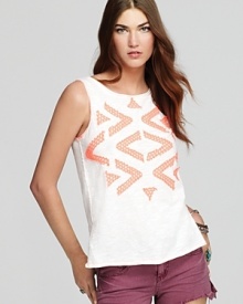 A vivid tribal print stands out on this easy Free People tank for a punchy poolside look.