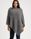 A romantic neckline and relaxed fit ensure this sparkling poncho will be a complementary layer for your favorite wardrobe. Pull-on styleAsymmetrical hemAbout 25 from shoulder to hemMohair/nylon/wool/polyester/acrylic/alpacaDry cleanImported of Italian fabric