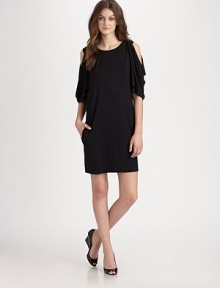 A relaxed-yet-flattering fit and sexy cold-shoulder details create the quintessential LBD: a classic shift with modern touches. Round neckElbow-length sleevesCold shouldersAbout 35 from shoulder to hem93% lyocell/7% elastaneDry cleanImported Model shown is 5'10 (177cm) wearing US size Small. 