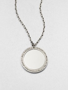 A simply chic circular pendant accented with sparkling rhinestones on a link chain. Glass stonesIon-plated brass and steelLength, about 16Pendant size, about .66 Lobster clasp closureImported 