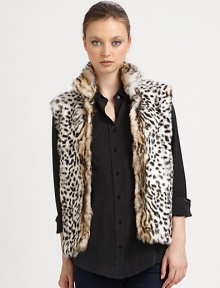 A leopard printed, dyed rabbit style in an easy to layer vest design. Stand collarSleevelessOpen frontAbout 24 from shoulder to hemFully linedDyed rabbitSpecialist dry cleanImported Fur origin: Spain 