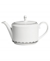 Vera Wang marries modern shapes with traditional lace in this set of dinnerware. The dishes are decidedly timeless. Platinum trim and banding add delicate feminine touches to this white bone china teapot.