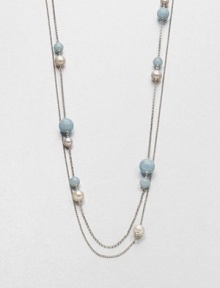 From the Sphere Collection. A long and graceful silver chain, to wrap as you choose, dotted with freshwater pearls and aquamarine beads.White cultured freshwater pearlsAquamarineSterling silverLength, about 45Special signature claspImported