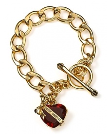 Have a heart. Juicy Couture's gold-plated link bracelet is a charming starter, best when decked with couture tokens.