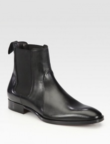 Side elastic gores and minimal detailing shapes and defines this charming chelsea boot constructed in Italy from smooth, supple calfskin leather.Leather upperLeather liningPadded insoleLeather soleMade in Italy