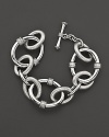 Large sterling silver links form an elegant bracelet. By Judith Ripka.