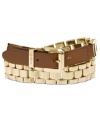 Inspired by classic belt silhouettes, this Michael Kors bracelet features watch links in golden hues and a leather buckle. Crafted in gold tone steel. Approximate length: 16 inches. Approximate width: 1/2 inch.