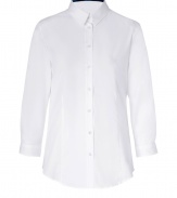 Build the foundations of your polished workweek looks with Burberry Londons crisp cotton 3/4 sleeve button-down - Classic collar with tonal marine check lining, 3/4 length sleeves, buttoned cuffs, button-down front, shirttail hemline - Tailored fit - Wear with everything from jeans and flats to pencil skirts and heels