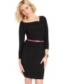 A bright skinny belt adds pop to a little black dress that boasts elements of chic design! From Tempted.