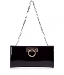 Inimitable Italian craftsmanship meets classic elegance with Salvatore Ferragamos luxurious patent leather Norina clutch - Traditional envelope shape with a detachable chain link handle and silver Gancio bit accent - Magnetic closure and satin lining - Single interior open pocket - Perfect for parties and cocktails and roomy enough to fit all of the evening essentials - Height: 4.75 - Width: 9 - Depth: 1.25 - Made in Italy