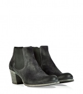 Versatile and incredibly chic, achieve effortless style in these stylishly distressed leather boots from N.d.c - Upturned round toe, chunky stacked heel, elasticized side panels, ankle-length - Style with skinny jeans, leggings, or corduroys