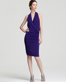 Nicole Miller epitomizes effortless elegance with this sheath dress, cut in a slinky silhouette.