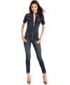 Take your street style seriously in Baby Phat's short-sleeve denim jumpsuit! Features skinny leg design and clean zip details that make this look unforgettable.