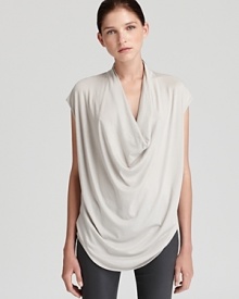 A chic draped neckline brings effortless elegance to this voluminous Helmut Lang top.