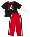 For the future athlete in your family. He'll look ready to conquer the basketball court with this matching set from Nike Jordan.