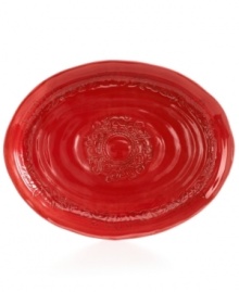 Homegrown style. An organic shape and engraved florals give the Espana Antica platter a handcrafted feel that suits country settings. With a glossy red finish. From the Tabletops Unlimited dinnerware collection.