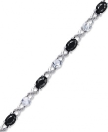 Embrace some glamour now and then. This pretty crisscross patterned bracelet highlights oval-cut onyx (3-1/3 ct. t.w.), round-cut white topaz (2-3/8 ct. t.w.) and sparkling diamond accents. Approximate length: 7-1/2 inches.