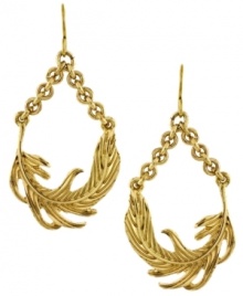 Blowing in the wind. Delicate sideways leaf charms hang from chunky chains in BCBGeneration's breezy hoop earrings. Crafted in gold tone mixed metal. Approximate drop: 2 inches.