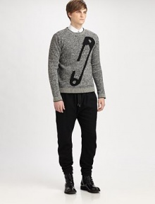 A classic crewneck sweater with an iconic McQ Alexander McQueen design.CrewneckLong sleevesContrast trimVirgin woolDry cleanImported