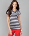 Chic to a T - get the look in this classic tee from Tommy Hilfiger. Pair it with on-trend colored jeans for a look that's so right now! (Clearance)