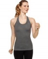 Dri-FIT technology and a long slim fit give this Nike tank top moisture-wicking technology and comfortable coverage for your toughest workouts.