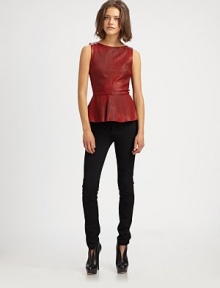 Featuring hot-right-now peplum, a silk-lined, butter-soft leather top with undeniable appeal.Round neckSleevelessPeplum hemBack zipperAbout 24 from shoulder to hemBody: lambskin leatherLining: silkDry clean by leather specialistImportedSIZE & FIT Model shown is 5'10 (177cm) wearing a US size Small. 