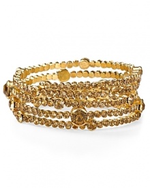 Bring glamorous shine to your looks with Aqua's golden station wrap bracelet.