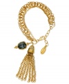 Worth the tassel. Gold stands out in this link bracelet from T Tahari. Crafted of 14k gold-plated, nickel-free mixed metal, the bracelet features a tassel pendant and black accents. Approximate length: 7-1/2 inches + 1-inch extender.