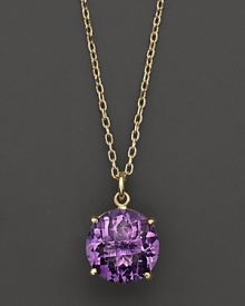 An elegant amethyst pendant necklace in 18 Kt. yellow gold. With Roberto Coin's signature ruby accents.