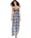 Metallic touches add a shot of shine to this printed maxi from BCBGMAXAZRIA. Show off the strapless silhouette with a luxe necklace!