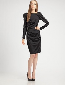 A slinky silhouette with puff sleeves, gathered waist with beaded detail and deep V back. Bateau neckline in front Long sleeves Back zip closure Full lining 63% acetate/35% nylon/2% spandex Dry clean gently; protect beading Made in USA of Canadian fabricOUR FIT MODEL RECOMMENDS ordering true size. 